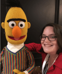 Natalie Engel posing with Bert from Sesame Street